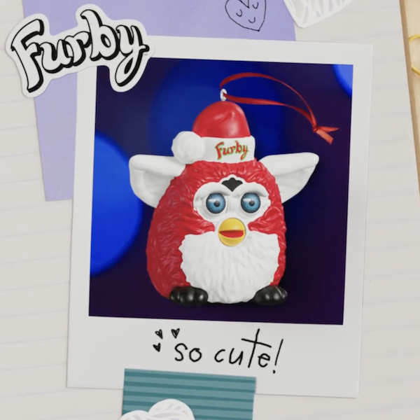 A Keepsake Ornament featuring the 1990s toy Furby.